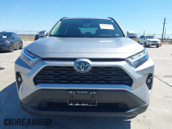 2023 Toyota RAV4 Hybrid XLE Premium z VIN 4T3B6RFV6PU139151, wystawiony jako IAAI lot #41665860 z przebiegiem 7 171 mil mil oraz . Historia ofert i sprzedaży dostępna na DreamBid. Obrazek 13.