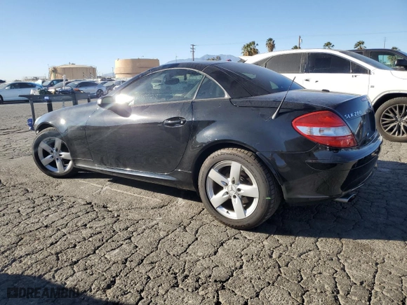2006 Mercedes-Benz SLK-Class 3.0L with VIN WDBWK54F86F115935, listed as a Copart auction lot 88819205 with 55,947 mi miles and Salvage Title. Bid and sale history available at carsss.com. Image 2.