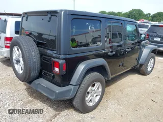 2023 Jeep Wrangler Sport S with VIN 1C4HJXDN6PW599895, listed as a IAAI auction lot 42242107 with 53,980 mi miles and . Bid and sale history available at DreamBid. Image 4.