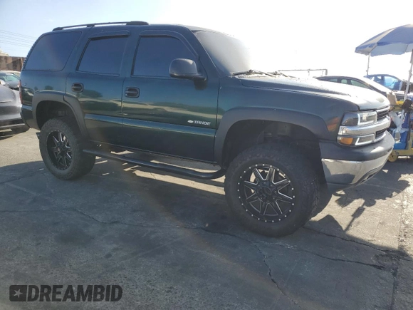 2003 Chevrolet Tahoe LS with VIN 1GNEC13V53R101245, listed as a Copart auction lot 65222214 with 259,040 mi miles and Salvage Title. Bid and sale history available at carsss.com. Image 4.