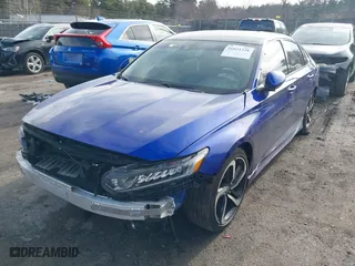 2020 Honda Accord Sedan Sport with VIN 1HGCV1F33LA145572, listed as a IAAI auction lot 41821328 with 54,956 mi miles. Bid and sale history available at carsss.com. Image 2.