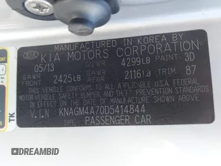 2013 Kia Optima LX z VIN KNAGM4A70D5414844, wystawiony jako IAAI lot #41774246 z przebiegiem 180 332 mil mil oraz . Historia ofert i sprzedaży dostępna na DreamBid. Obrazek 9.