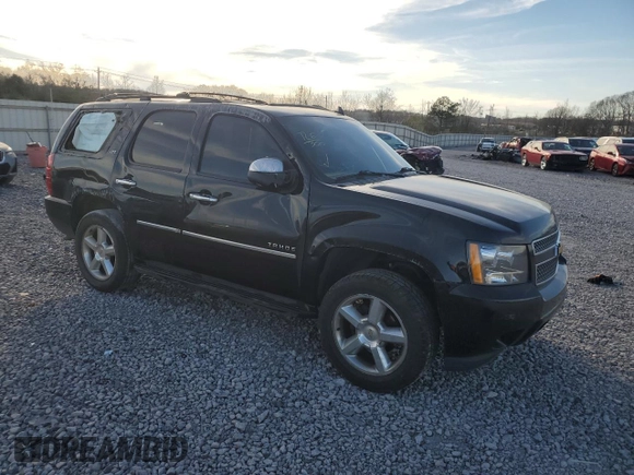 2013 Chevrolet Tahoe LTZ with VIN 1GNSCCE04DR162474, listed as a Copart auction lot 49386335 with 331,358 mi miles and Salvage title. Bid and sale history available at DreamBid. Image 4.