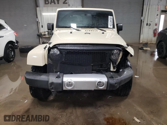 2011 Jeep Wrangler Sahara with VIN 1J4AA5D19BL577347, listed as a Copart auction lot 80340124 with 148,986 mi miles and Salvage Title. Bid and sale history available at DreamBid. Image 5.