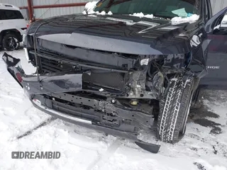 2023 Chevrolet Tahoe Premier with VIN 1GNSKSKL6PR545302, listed as a IAAI auction lot 41017179 with 16,877 mi miles and . Bid and sale history available at DreamBid. Image 6.