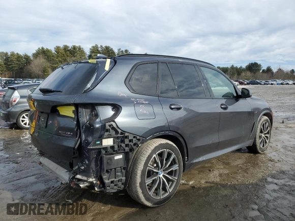 2022 BMW X5 xDrive45e with VIN 5UXTA6C0XN9M02912, listed as a Copart auction lot 45491845 with 14,586 mi miles and Salvage Title. Bid and sale history available at DreamBid. Image 3.