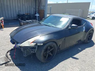 2013 Nissan 370Z z VIN JN1AZ4EH8DM880849, wystawiony jako IAAI lot #42131189 z przebiegiem Nie podano mil oraz . Historia ofert i sprzedaży dostępna na DreamBid. Obrazek 18.