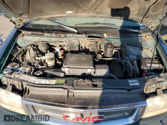 1998 GMC Safari z VIN 1GDDM19W5WB503552, wystawiony jako Copart lot #88247495 z przebiegiem 267 494 mil mil oraz Szkoda całkowita • Salvage title. Historia ofert i sprzedaży dostępna na DreamBid. Obrazek 12.