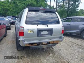 2000 Toyota 4Runner SR5 z VIN JT3HN86R1Y0296588, wystawiony jako IAAI lot #42193276 z przebiegiem 177 968 mil mil oraz . Historia ofert i sprzedaży dostępna na DreamBid. Obrazek 6.