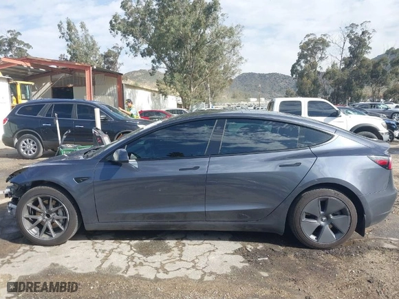 2023 Tesla Model 3 with VIN 5YJ3E1EAXPF569360, listed as a IAAI auction lot 41648207 with 29,828 mi miles. Bid and sale history available at carsss.com. Image 15.