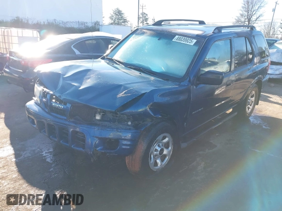 2004 Isuzu Rodeo S with VIN 4S2CK58W444314265, listed as a IAAI auction lot 41294636 with 291,080 mi miles and . Bid and sale history available at DreamBid. Image 2.