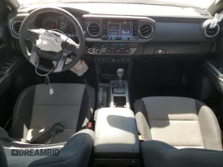 2023 Toyota Tacoma SR z VIN 3TMCZ5AN8PM589655, wystawiony jako Copart lot #56663615 z przebiegiem 43 327 mil mil oraz Szkoda całkowita • Salvage title. Historia ofert i sprzedaży dostępna na DreamBid. Obrazek 8.
