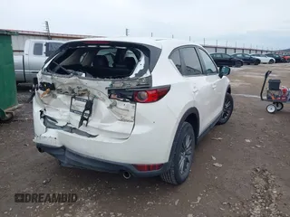 2020 Mazda CX-5 Touring with VIN JM3KFBCM6L0764982, listed as a IAAI auction lot 41632293 with 96,042 mi miles. Bid and sale history available at carsss.com. Image 4.