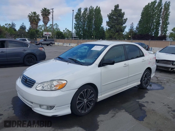 2004 Toyota Corolla CE with VIN JTDBR32E440052035, listed as a IAAI auction lot 42218301 with 299,999 mi miles. Bid and sale history available at carsss.com. Image 6.