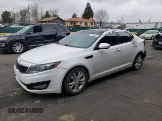2013 Kia Optima EX with VIN 5XXGN4A73DG130801, listed as a Copart auction lot 51141965 with 118,842 mi miles and Salvage title. Bid and sale history available at DreamBid. Image 1.