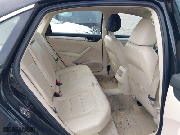 2012 Volkswagen Passat SE with VIN 1VWBP7A37CC021336, listed as a IAAI auction lot 41724459 with 124,832 mi miles. Bid and sale history available at carsss.com. Image 8.