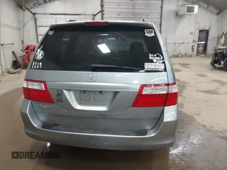 2006 Honda Odyssey EX with VIN 5FNRL38446B044231, listed as a IAAI auction lot 42080586 with 211,908 mi miles. Bid and sale history available at carsss.com. Image 16.