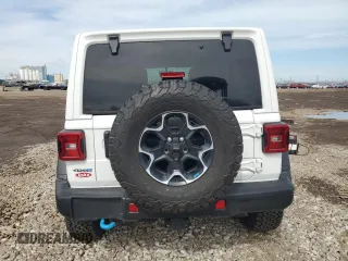 2023 Jeep Wrangler Rubicon z VIN 1C4JJXR6XPW663181, wystawiony jako Copart lot #49799125 z przebiegiem 8 085 mil mil oraz Szkoda całkowita • Salvage title. Historia ofert i sprzedaży dostępna na DreamBid. Obrazek 6.