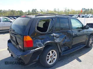 2007 GMC Envoy Denali with VIN 1GKES63MX72103849, listed as a IAAI auction lot 41904190 with 237,261 mi miles. Bid and sale history available at carsss.com. Image 6.