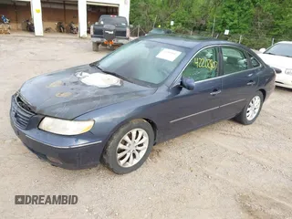 2007 Hyundai Azera SE with VIN KMHFC46F47A195122, listed as a IAAI auction lot 42202807 with 70,694 mi miles and . Bid and sale history available at DreamBid. Image 2.