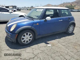 2004 MINI Hardtop z VIN WMWRC334X4TC51451, wystawiony jako Copart lot #61268235 z przebiegiem 149 750 mil mil oraz Szkoda całkowita • Salvage title. Historia ofert i sprzedaży dostępna na DreamBid. Obrazek 1.