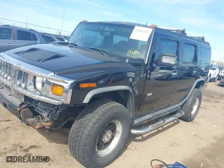2005 Hummer H2 SUV with VIN 5GRGN23U05H128420, listed as a IAAI auction lot 41983395 with 194,925 mi miles. Bid and sale history available at carsss.com. Image 2.
