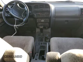 1999 Isuzu Trooper S с VIN JACDJ58X1X7931474, выставлен на аукционе Copart как лот 80273494 с пробегом 295 128 миль миль и Чистый • Clean title. История ставок и продаж доступна на DreamBid. Изображение 8.