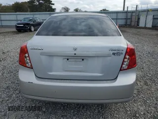 2006 Suzuki Forenza z VIN KL5JD56Z96K362651, wystawiony jako Copart lot #78306894 z przebiegiem 167 916 mil mil oraz Tytuł czysty. Historia ofert i sprzedaży dostępna na DreamBid. Obrazek 6.