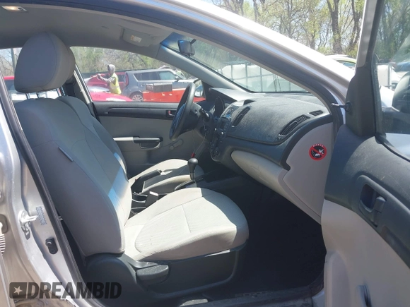 2010 Kia Forte LX with VIN KNAFT4A29A5061695, listed as a IAAI auction lot 42034559 with 114,470 mi miles. Bid and sale history available at carsss.com. Image 5.