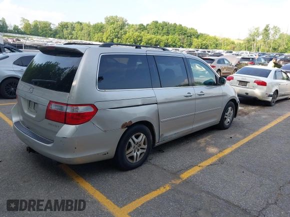 2005 Honda Odyssey EX-L with VIN 5FNRL38715B003399, listed as a IAAI auction lot 42589092 with 252,737 mi miles and . Bid and sale history available at DreamBid. Image 4.