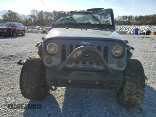 2014 Jeep Wrangler Sport z VIN 1C4AJWAG0EL119835, wystawiony jako Copart lot #88498755 z przebiegiem 151 756 mil mil oraz Szkoda całkowita • Salvage title. Historia ofert i sprzedaży dostępna na DreamBid. Obrazek 5.