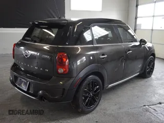 2016 MINI Countryman S with VIN WMWZC5C55GWU00997, listed as a Copart auction lot 58840965 with 41,217 mi miles and Salvage title. Bid and sale history available at DreamBid. Image 3.