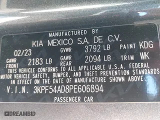 2023 Kia Forte GT-Line with VIN 3KPF54AD8PE606894, listed as a IAAI auction lot 42078975 with 52,457 mi miles. Bid and sale history available at carsss.com. Image 9.