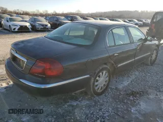 1999 Lincoln Continental with VIN 1LNHM97V2XY719495, listed as a Copart auction lot 42239665 with 234,544 mi miles and Salvage Title. Bid and sale history available at carsss.com. Image 3.
