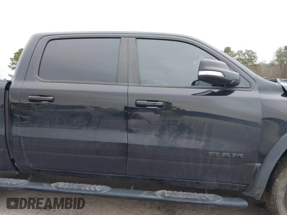 2019 Ram 1500 Rebel z VIN 1C6SRFLT1KN722064, wystawiony jako IAAI lot #41513201 z przebiegiem 113 559 mil mil oraz . Historia ofert i sprzedaży dostępna na DreamBid. Obrazek 14.