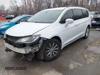 2017 Chrysler Pacifica Touring L with VIN 2C4RC1BG4HR583463, listed as a IAAI auction lot 41487599 with 180,459 mi miles and . Bid and sale history available at DreamBid. Image 19.