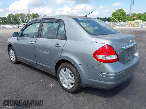 2011 Nissan Versa S with VIN 3N1BC1AP0BL392052, listed as a IAAI auction lot 42383113 with 198,633 mi miles and . Bid and sale history available at DreamBid. Image 3.