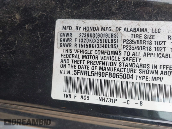 2015 Honda Odyssey Touring Elite with VIN 5FNRL5H90FB065004, listed as a IAAI auction lot 42461597 with 317,523 mi miles and . Bid and sale history available at DreamBid. Image 9.