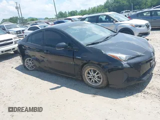 2017 Toyota Prius Two with VIN JTDKBRFU3H3051715, listed as a IAAI auction lot 42538212 with 107,740 mi miles and . Bid and sale history available at DreamBid. Image 1.