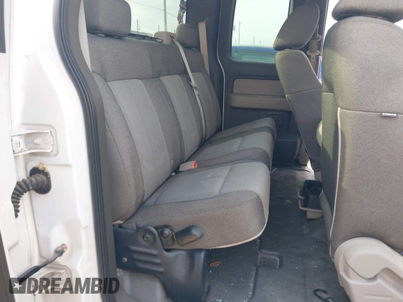 2009 Ford F-150 STX with VIN 1FTRX12W59KA47374, listed as a IAAI auction lot 41944557 with 194,066 mi miles and . Bid and sale history available at DreamBid. Image 8.