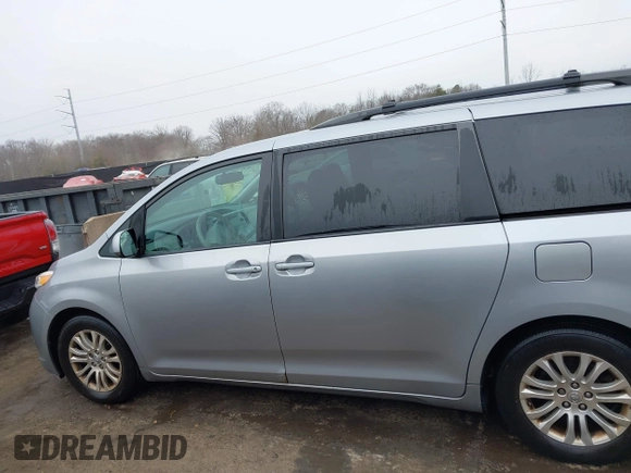 2014 Toyota Sienna XLE with VIN 5TDYK3DC5ES461184, listed as a IAAI auction lot 41447642 with 122,539 mi miles. Bid and sale history available at carsss.com. Image 14.