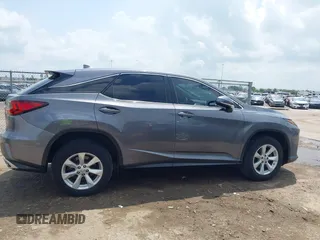 2016 Lexus RX 350 z VIN 2T2ZZMCAXGC031079, wystawiony jako IAAI lot #42120190 z przebiegiem 142 407 mil mil oraz . Historia ofert i sprzedaży dostępna na DreamBid. Obrazek 13.