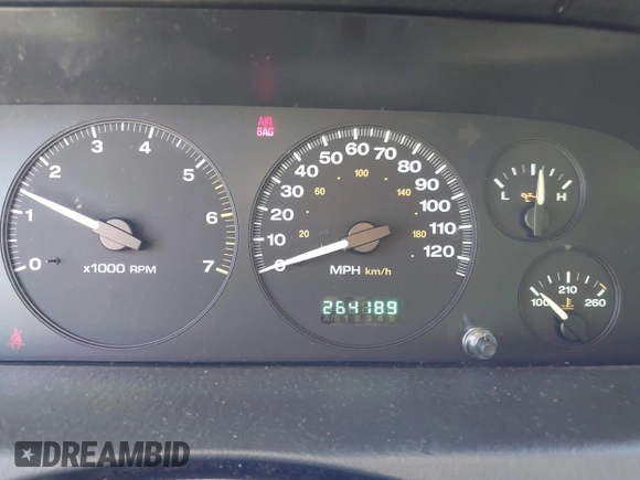 2002 Jeep Grand Cherokee z VIN 1J4GX38S32C238339, wystawiony jako IAAI lot #42653341 z przebiegiem 264 189 mil mil oraz . Historia ofert i sprzedaży dostępna na DreamBid. Obrazek 7.