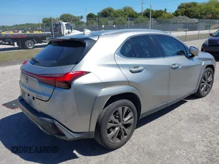 2022 Lexus UX 200 F Sport with VIN JTHE3JBH3N2056014, listed as a IAAI auction lot 41832434 with 25,693 mi miles and . Bid and sale history available at DreamBid. Image 4.