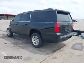 2019 Chevrolet Suburban LS with VIN 1GNSKGKC4KR128685, listed as a IAAI auction lot 42148721 with 92,346 mi miles and . Bid and sale history available at DreamBid. Image 3.