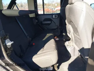 2021 Jeep Wrangler Unlimited Sport Altitude with VIN 1C4HJXDG8MW814044, listed as a IAAI auction lot 41437281 with 54,293 mi miles and . Bid and sale history available at DreamBid. Image 8.