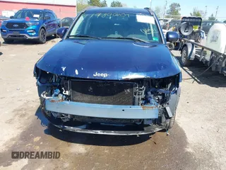 2014 Jeep Compass Latitude with VIN 1C4NJCEB2ED883243, listed as a IAAI auction lot 41989007 with 138,192 mi miles. Bid and sale history available at carsss.com. Image 6.