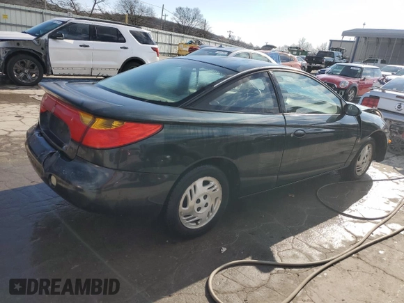 2001 Saturn SC z VIN 1G8ZR12721Z295252, wystawiony jako Copart lot #82608074 z przebiegiem 137 076 mil mil oraz Szkody całkowita. Historia ofert i sprzedaży dostępna na DreamBid. Obrazek 3.