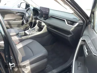 2025 Toyota RAV4 Hybrid XLE Premium with VIN 2T3B6RFV6SW084676, listed as a IAAI auction lot 41923759 with 15,856 mi miles and . Bid and sale history available at DreamBid. Image 5.