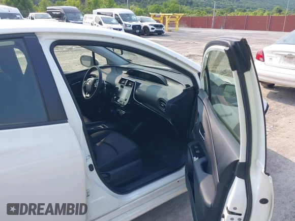 2021 Toyota Prius L Eco with VIN JTDKAMFU7M3147668, listed as a IAAI auction lot 42390394 with 80,831 mi miles and . Bid and sale history available at DreamBid. Image 5.